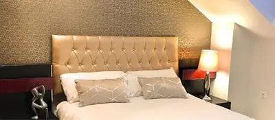 Cama o camas de una habitación en FUENTE REDONDA EN BAEZA