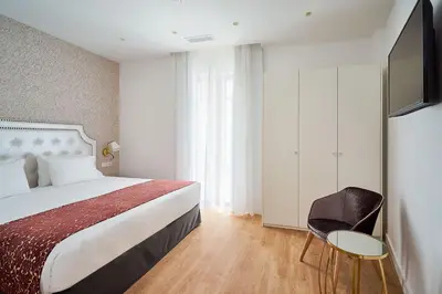 Cama o camas de una habitación en Tandem El Patio