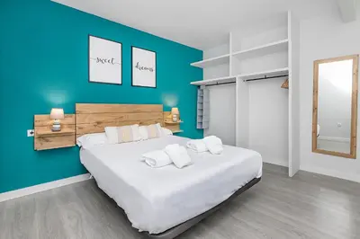 Cama o camas de una habitación en Califal San Pedro