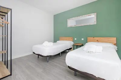 Cama o camas de una habitación en Califal San Pedro