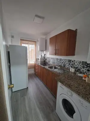 Una cocina o zona de cocina en Vivienda Turística Acogedora en los Patios de San Basilio