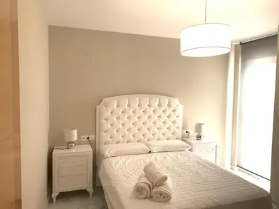 Cama o camas de una habitación en Apartment Lucena Center Bajo Parking Gratis