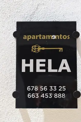 Certificado, premio, señal o documento que está expuesto en Apartamentos HELA