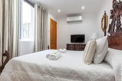 Cama o camas de una habitación en CASA DE LA LUZ -Elegante Casco Antiguo 5-Hab