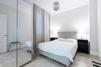 Cama o camas de una habitación en AoA Green Gardens Suites