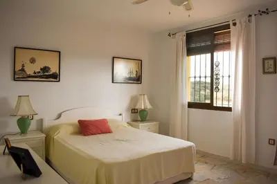 Cama o camas de una habitación en Finca La Lola - Secluded Andalusian Finca for Groups of up to 24 Guests