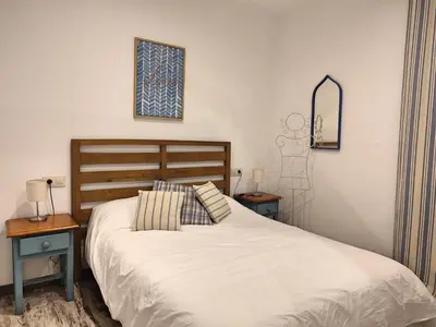 Cama o camas de una habitación en La Casa de Pedro Verdugo Apartamento Turístico