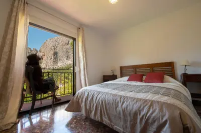 Cama o camas de una habitación en Casa El Chorro con magníficas vistas