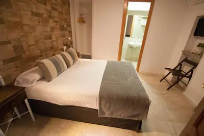 Cama o camas de una habitación en Hospedería Los Angeles