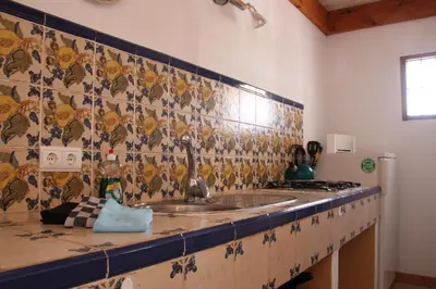 Una cocina o zona de cocina en Appartement El Balcon ( cortijo La Cubertilla)