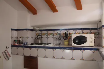 Una cocina o zona de cocina en Appartement El Patio (cortijo La Cubertilla)