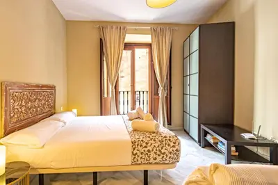 Cama o camas de una habitación en Puerta San Esteban
