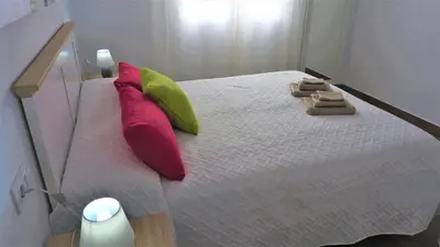 Cama o camas de una habitación en Viviendas con Fines Turisticos ``La Jamuga´´
