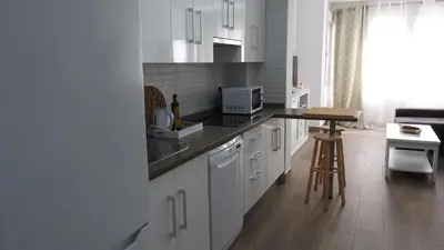 Una cocina o zona de cocina en Viviendas con Fines Turisticos ``La Jamuga´´
