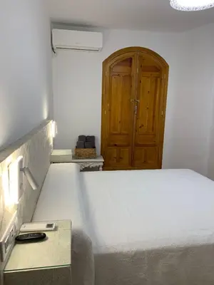 Cama o camas de una habitación en Bernardo López con opción a parking