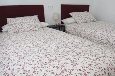 Cama o camas de una habitación en Patios de San Rafael