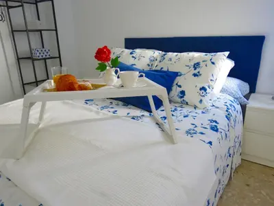Cama o camas de una habitación en Patios de San Rafael
