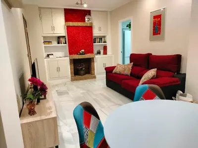 Una cocina o zona de cocina en Acogedor apartamento. Mezquita Wifi