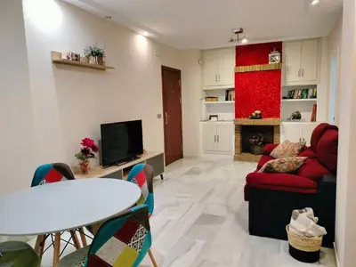 Una cocina o zona de cocina en Acogedor apartamento. Mezquita Wifi