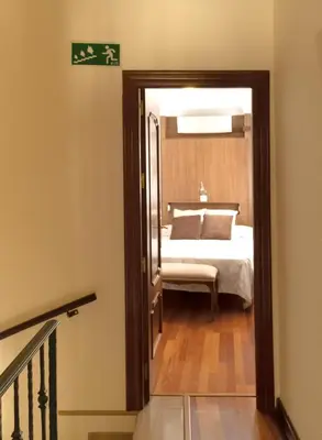 Cama o camas de una habitación en Alojamiento Turístico Fuente del Rey