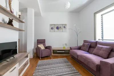 Una televisión o centro de entretenimiento en Veoapartment Jerónimo Terrace