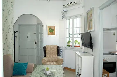 Una televisión o centro de entretenimiento en Apartamento San Juan de Dios
