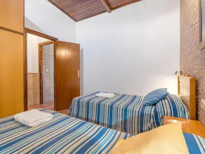 Cama o camas de una habitación en Holiday Home Rural Cacin by Interhome