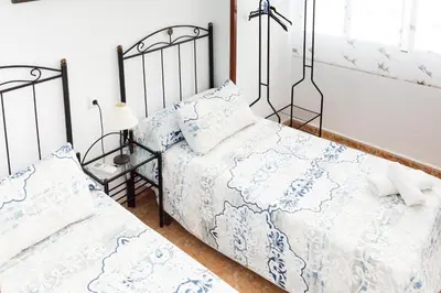 Cama o camas de una habitación en CASA DE ANA