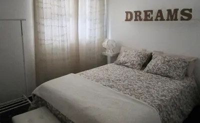 Cama o camas de una habitación en La Casa de Maribel