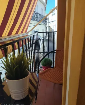 Un balcón o terraza de La Casa de Maribel