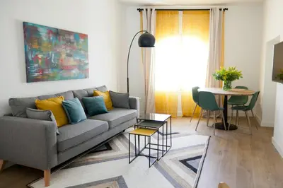 Zona de estar de GoToSeville GERONA SUITES