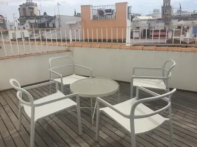Un balcón o terraza de GoToSeville GERONA SUITES