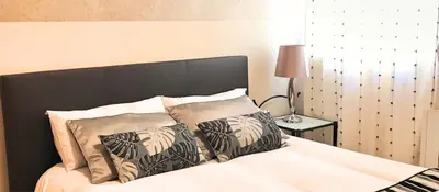 Cama o camas de una habitación en VENUS DE BAEZA SUITE