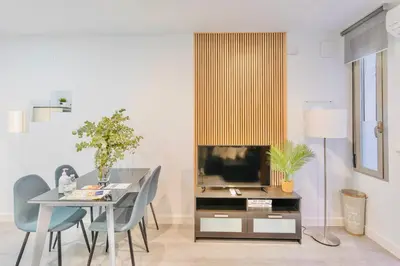 Una televisión o centro de entretenimiento en Apartamento Los Patios