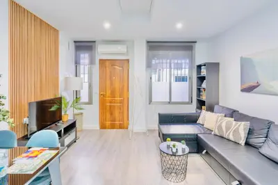 Una televisión o centro de entretenimiento en Apartamento Los Patios