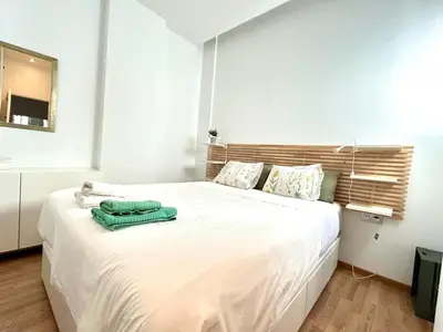 Cama o camas de una habitación en Hispalis Puerta Carmona