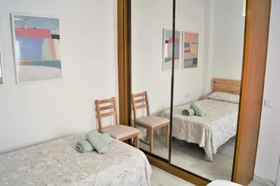 Cama o camas de una habitación en Reformado Coqueto Fleming a 5 minutos Mezquita WIFI AIRE POSIBILIDAD PARKING