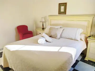 Cama o camas de una habitación en Apartamento Claudio Marcelo