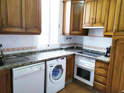 Una cocina o zona de cocina en Apartamento Claudio Marcelo