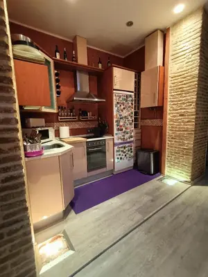 Una cocina o zona de cocina en COSY DOUBLE ROOM + PRIVATE BATHROOM SEVILLA CENTER