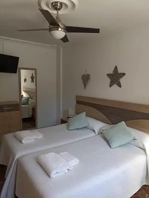 Cama o camas de una habitación en CALIFAL