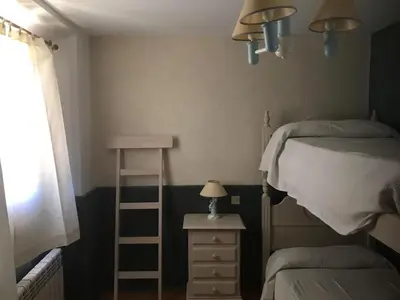 Cama o camas de una habitación en Paredejas del Rey
