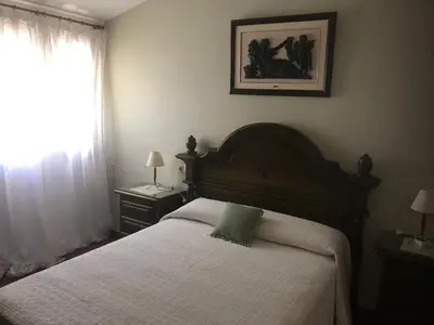 Cama o camas de una habitación en Paredejas del Rey