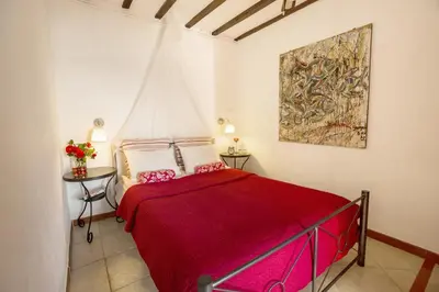 Cama o camas de una habitación en El Arpa
