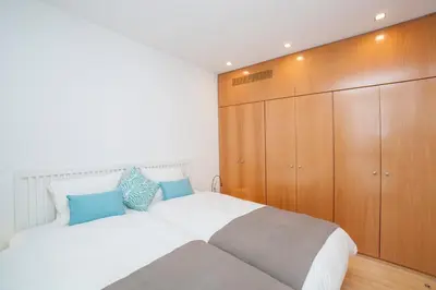 Cama o camas de una habitación en Alohamundi San Marcos