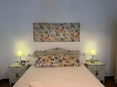 Cama o camas de una habitación en Loft Jazmin junto a Puente Romano