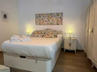 Cama o camas de una habitación en Loft Jazmin junto a Puente Romano