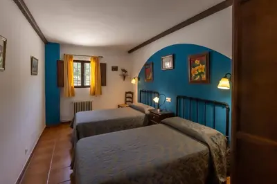 Cama o camas de una habitación en Cortijo Entresierras
