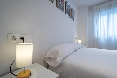 Cama o camas de una habitación en Jardines de Cervantes