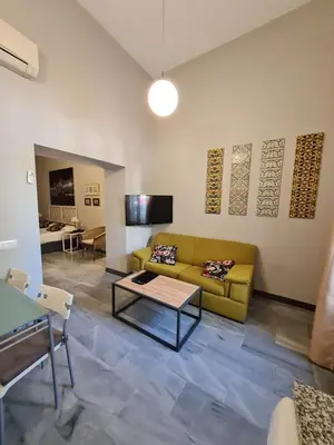 Una televisión o centro de entretenimiento en DreamsApt Curtidores 6 Suites AT